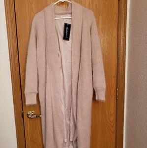 A brand new Belldini open sweater